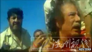 利比亞當局武裝指揮官自稱對卡扎菲之死“負全責”