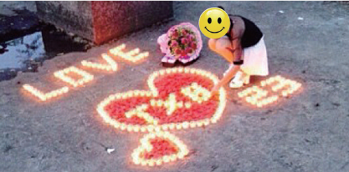 初中女生擺心形蠟燭表白